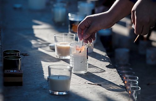 JOHN WOODS / WINNIPEG FREE PRESS
Israel supporters light candles as they gathered to support the war with Palestine at the Manitoba Legislature in Winnipeg Sunday, October 15, 2023. 

Reporter: searle