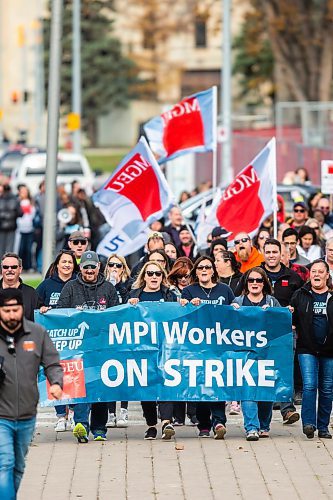 MIKAELA MACKENZIE / WINNIPEG FREE PRESS

Striking MPI employees rally at the Manitoba Legislative Building on Tuesday, Oct. 17, 2023. For Malak story.
Winnipeg Free Press 2023.