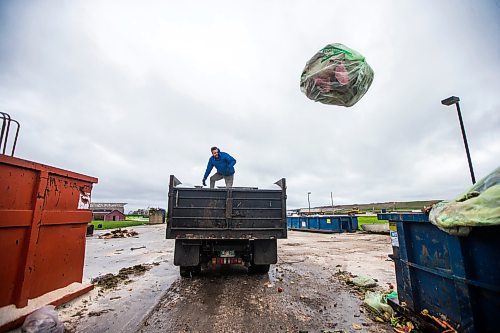 MIKAELA MACKENZIE / WINNIPEG FREE PRESS

Garrett LeBlanc, compost courier with Compost Winnipeg, prepares to dump the load of compost at Prairie Green Landfill, where it gets composted, in Winnipeg on Tuesday, May 31, 2022. For JS story.
Winnipeg Free Press 2022.