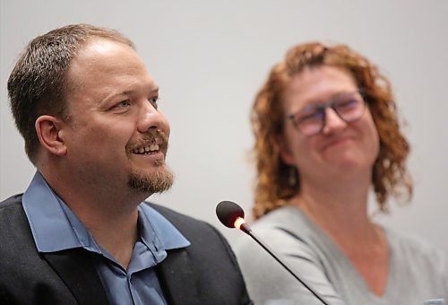 Byelection trustee candidate Sheri Miller, right, smiles as fellow candidate Kirk Carr jokes at his own lost train of thought while answering a question during the all-candidates forum on Wednesday evening at Brandon University's Evans Theatre.  (Matt Goerzen/The Brandon Sun)