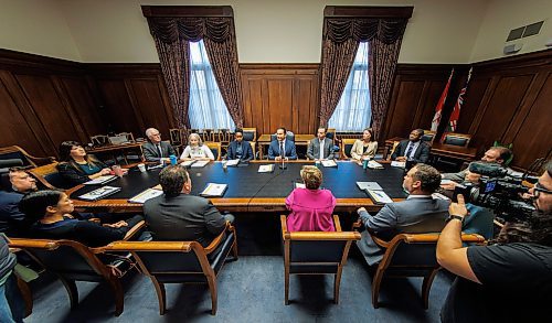 Premier Wab Kinew meets with members of the executive council for their first cabinet meeting at the Manitoba Legislative building Thursday morning. (Mike Deal/Winnipeg Free Press)