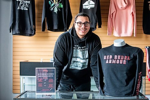 MIKAELA MACKENZIE / WINNIPEG FREE PRESS

Sean Rayland, owner of Red Rebel Armour, at the company&#x2019;s storefront and production space on Century Street on Friday, Oct. 20, 2023. Rayland spent his youth going in and out of prison. Now in his 30s, the father of eight established his clothing business in 2018 after deciding to change the direction of his life. For AV story.
Winnipeg Free Press 2023.