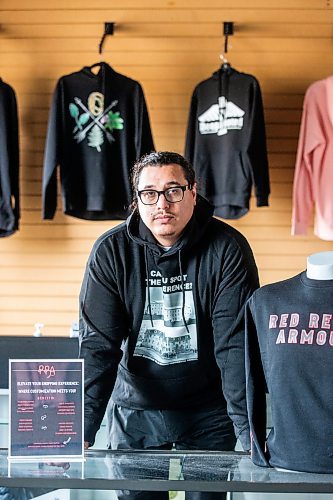 MIKAELA MACKENZIE / WINNIPEG FREE PRESS

Sean Rayland, owner of Red Rebel Armour, at the company&#x2019;s storefront and production space on Century Street on Friday, Oct. 20, 2023. Rayland spent his youth going in and out of prison. Now in his 30s, the father of eight established his clothing business in 2018 after deciding to change the direction of his life. For AV story.
Winnipeg Free Press 2023.