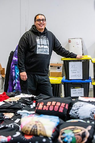 MIKAELA MACKENZIE / WINNIPEG FREE PRESS

Sean Rayland, owner of Red Rebel Armour, at the company&#x2019;s storefront and production space on Century Street on Friday, Oct. 20, 2023. Rayland spent his youth going in and out of prison. Now in his 30s, the father of eight established his clothing business in 2018 after deciding to change the direction of his life. For AV story.
Winnipeg Free Press 2023.