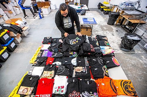 MIKAELA MACKENZIE / WINNIPEG FREE PRESS

Sean Rayland, owner of Red Rebel Armour, at the company&#x2019;s storefront and production space on Century Street on Friday, Oct. 20, 2023. Rayland spent his youth going in and out of prison. Now in his 30s, the father of eight established his clothing business in 2018 after deciding to change the direction of his life. For AV story.
Winnipeg Free Press 2023.