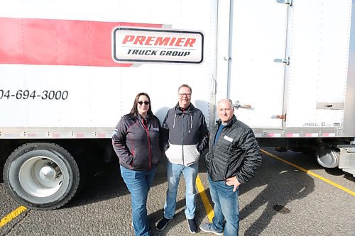 L-R: Premier Truck Group of Brandon Service Advisor Stephanie Sansom; Branch manager Dwayne Stone; Sales Representative Rois McEwen at the 3rd Annual Fill The Freightliner on Saturday in Brandon (Abiola Odutola/The Brandon Sun)