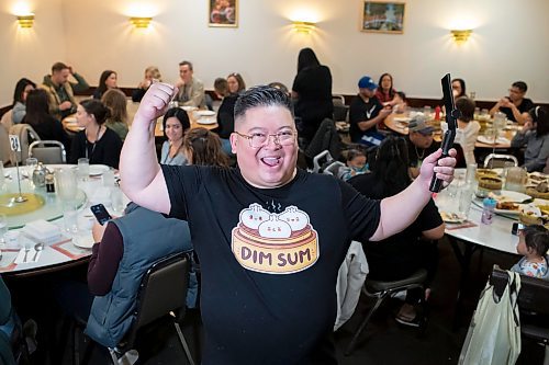 BROOK JONES / WINNIPEG FREE PRESS
Forty-one-year-old Carter Chen showing his enthusiams for the Chinatown Dim Sum Tour he is leading in Winnipeg, Man., on the afternoon of Saturday, Oct. 21, 2023. Chen, who has his very own Dim Sum T-shirt, is pictured at Dim Garden at 245 King St., which was one of two stops on the tour. The other location was Sam Po Restaurant at 277 Rupert Ave.