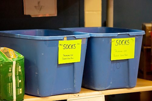 BROOK JONES / WINNIPEG FREE PRESS
Sock bins are pictured in the clothing donation area of the Main Street Project in Winnipeg, Man., Friday, Oct. 20, 2023. The local shelter is collecting donations of socks for its Socktober campaign. The shelter also needs donations of everyday clothing items and with cooler weather approaching, donations of thermal wear, winter boots, winter jackets, snow pants, scarves and hand warmers are also in need.