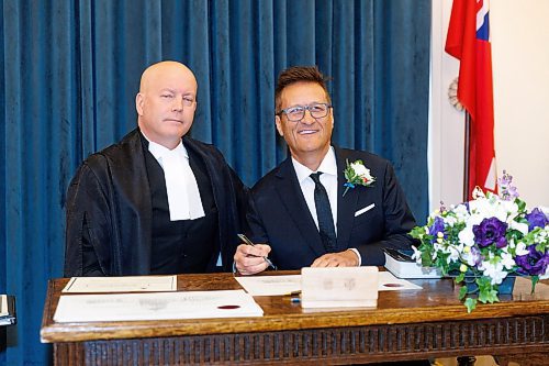 MIKE DEAL / WINNIPEG FREE PRESS
PC Caucus Chair Ron Schuler signs his oath of office during the swearing in ceremony, with officiating being done by Rick Yarish, Deputy Clerk at Manitoba Legislative Assembly.
PC Leader Heather Stefanson, PC Caucus Chair Ron Schuler and all other 20 PC MLA-elects attend Room 200 in the Manitoba Legislative building for the swearing in ceremony for PC MLAs.
231023 - Monday, October 23, 2023.