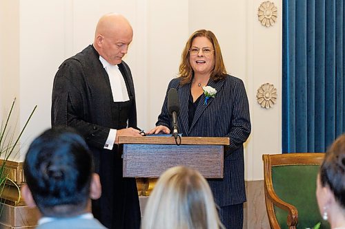 MIKE DEAL / WINNIPEG FREE PRESS
PC Leader Heather Stefanson says her oath of office during the swearing in ceremony, with officiating being done by Rick Yarish, Deputy Clerk at Manitoba Legislative Assembly.
PC Leader Heather Stefanson, PC Caucus Chair Ron Schuler and all other 20 PC MLA-elects attend Room 200 in the Manitoba Legislative building for the swearing in ceremony for PC MLAs.
231023 - Monday, October 23, 2023.