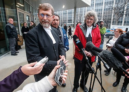 JOHN WOODS / WINNIPEG FREE PRESS
Jerome Kennedy, left, and James Lockyer, lawyers with Innocence Canada, speak about the bail hearing of Clarence Woodhouse outside the Manitoba law courts in Winnipeg as Clarence&#x573; cousin Brian Anderson, centre, who was exonerated in July for the same crime, listens in after Woodhouse&#x573; bail hearing Monday, October 23, 2023. Woodhouse and three other men were convicted 49 years ago of the murder of Ting Fong Chan. Two of those men were exonerated of the murder in July, one has died and Woodhouse is the last to have his conviction overturned. 

Reporter: Katrina