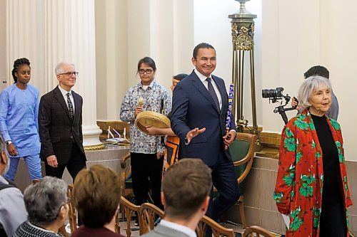 MIKE DEAL / WINNIPEG FREE PRESS
Premier Wab Kinew leads the other 33 NDP MLA-elects into Room 200 in the Manitoba Legislative building for the swearing in ceremony for NDP MLAs.
231023 - Monday, October 23, 2023.