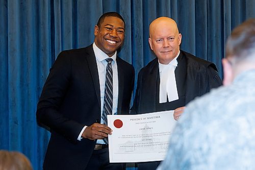 MIKE DEAL / WINNIPEG FREE PRESS
Jamie Moses during the swearing in ceremony, with officiating being done by Rick Yarish, Deputy Clerk at Manitoba Legislative Assembly.
Premier Wab Kinew and all other 33 NDP MLA-elects attend Room 200 in the Manitoba Legislative building for the swearing in ceremony for NDP MLAs.
231023 - Monday, October 23, 2023.