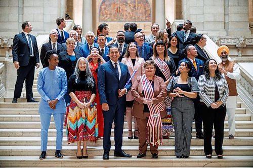 MIKE DEAL / WINNIPEG FREE PRESS
Premier Wab Kinew and all other 33 NDP MLA-elects on the grand staircase at the Manitoba Legislative building after the swearing in ceremony for NDP MLAs.
231023 - Monday, October 23, 2023.