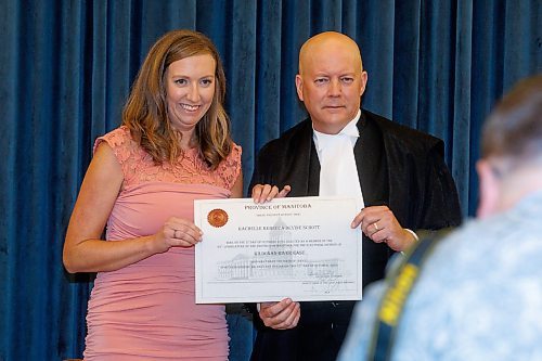 MIKE DEAL / WINNIPEG FREE PRESS
Rachelle Schott during the swearing in ceremony, with officiating being done by Rick Yarish, Deputy Clerk at Manitoba Legislative Assembly.
Premier Wab Kinew and all other 33 NDP MLA-elects attend Room 200 in the Manitoba Legislative building for the swearing in ceremony for NDP MLAs.
231023 - Monday, October 23, 2023.
