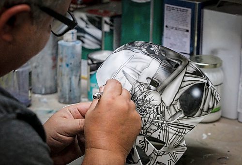 JOHN WOODS / WINNIPEG FREE PRESS
Tony Bage, founder of Wicked Goalie, works on his latest creation in his home studio in Winnipeg Monday, October 23, 2023. Bage has been airbrushing hockey masks and other things like motorcycles for close to 30 years.
Reporter: sanderson