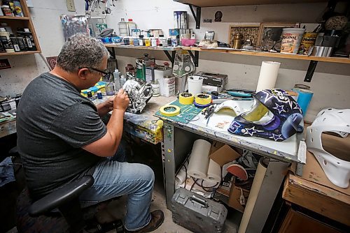JOHN WOODS / WINNIPEG FREE PRESS
Tony Bage, founder of Wicked Goalie, works on his latest creation in his home studio in Winnipeg Monday, October 23, 2023. Bage has been airbrushing hockey masks and other things like motorcycles for close to 30 years.
Reporter: sanderson