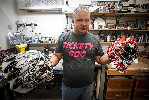 JOHN WOODS / WINNIPEG FREE PRESS
Tony Bage, founder of Wicked Goalie, works on his latest creation in his home studio in Winnipeg Monday, October 23, 2023. Bage has been airbrushing hockey masks and other things like motorcycles for close to 30 years.

Reporter: sanderson