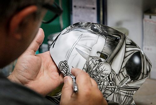 JOHN WOODS / WINNIPEG FREE PRESS
Tony Bage, founder of Wicked Goalie, works on his latest creation in his home studio in Winnipeg Monday, October 23, 2023. Bage has been airbrushing hockey masks and other things like motorcycles for close to 30 years.
Reporter: sanderson