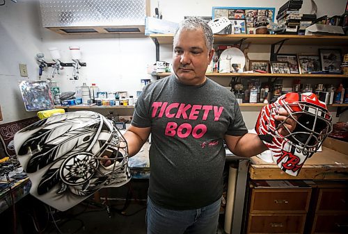 JOHN WOODS / WINNIPEG FREE PRESS
Tony Bage, founder of Wicked Goalie, works on his latest creation in his home studio in Winnipeg Monday, October 23, 2023. Bage has been airbrushing hockey masks and other things like motorcycles for close to 30 years.

Reporter: sanderson