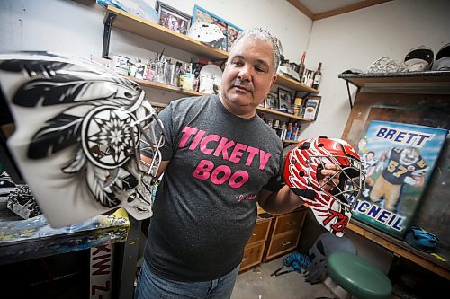 JOHN WOODS / WINNIPEG FREE PRESS
Tony Bage, founder of Wicked Goalie, works on his latest creation in his home studio in Winnipeg Monday, October 23, 2023. Bage has been airbrushing hockey masks and other things like motorcycles for close to 30 years.

Reporter: sanderson