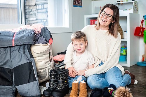 MIKAELA MACKENZIE / WINNIPEG FREE PRESS

Hudson Lylyk, 5, and his mom, mom, Bria Lylyk, with the snow gear Hudson has fundraised to provide for Koats for Kids on Tuesday, Oct. 24, 2023. For Tyler story.
Winnipeg Free Press 2023.