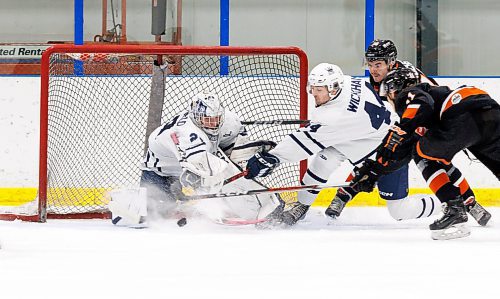 MIKE DEAL / WINNIPEG FREE PRESS
Dauphin Kings&#x2019; goalie Cole Sheffield (29) knocks the puck away during first period action against the Winkler Flyers at the Seven Oaks Sportsplex Tuesday afternoon.
See Mike Sawatzky story
231024 - Tuesday, October 24, 2023.