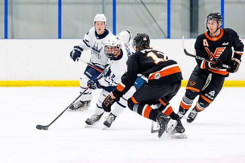 MIKE DEAL / WINNIPEG FREE PRESS
Dauphin Kings&#x2019; Blake Boudreau (9) stick with the puck against Winkler Flyers during game action at the Seven Oaks Sportsplex Tuesday afternoon.
See Mike Sawatzky story
231024 - Tuesday, October 24, 2023.