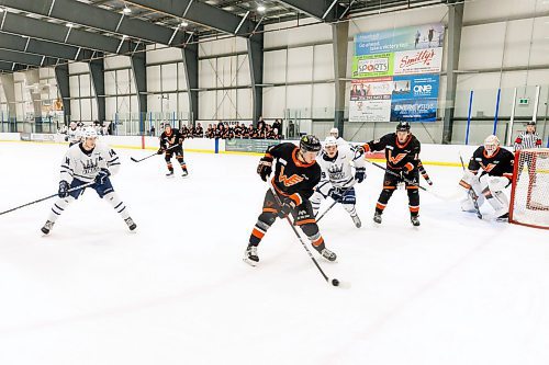 MIKE DEAL / WINNIPEG FREE PRESS
Winkler Flyers&#x2019; Isaiah Peters (4) with the puck during game action against the Dauphin Kings at the Seven Oaks Sportsplex Tuesday afternoon.
See Mike Sawatzky story
231024 - Tuesday, October 24, 2023.