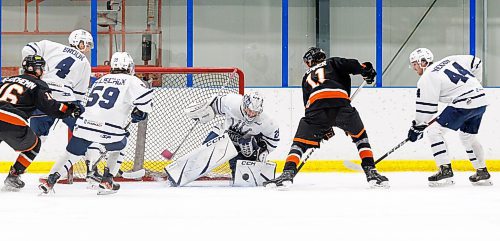 MIKE DEAL / WINNIPEG FREE PRESS
Dauphin Kings&#x2019; goalie Cole Sheffield (29) knocks the puck away during first period action against the Winkler Flyers at the Seven Oaks Sportsplex Tuesday afternoon.
See Mike Sawatzky story
231024 - Tuesday, October 24, 2023.