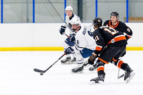 MIKE DEAL / WINNIPEG FREE PRESS
Dauphin Kings&#x2019; Blake Boudreau (9) stick with the puck against Winkler Flyers during game action at the Seven Oaks Sportsplex Tuesday afternoon.
See Mike Sawatzky story
231024 - Tuesday, October 24, 2023.