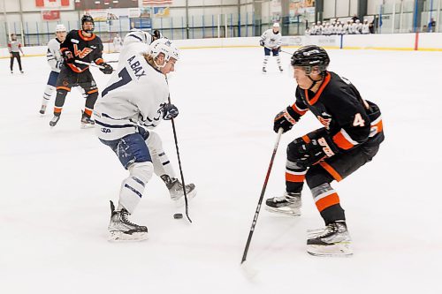 MIKE DEAL / WINNIPEG FREE PRESS
Dauphin Kings&#x2019; Anthony Bax (7) with the puck during game action against the Winkler Flyers at the Seven Oaks Sportsplex Tuesday afternoon.
See Mike Sawatzky story
231024 - Tuesday, October 24, 2023.