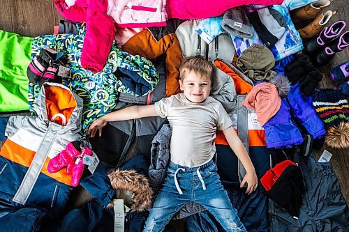 MIKAELA MACKENZIE / WINNIPEG FREE PRESS

Hudson Lylyk, 5, with some of the snow gear he has fundraised to provide for Koats for Kids on Tuesday, Oct. 24, 2023. For Tyler story.
Winnipeg Free Press 2023.