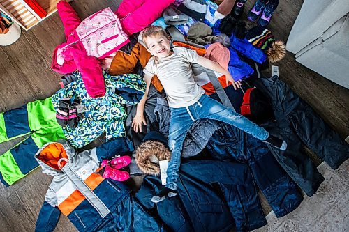 MIKAELA MACKENZIE / WINNIPEG FREE PRESS

Hudson Lylyk, 5, with some of the snow gear he has fundraised to provide for Koats for Kids on Tuesday, Oct. 24, 2023. For Tyler story.
Winnipeg Free Press 2023.