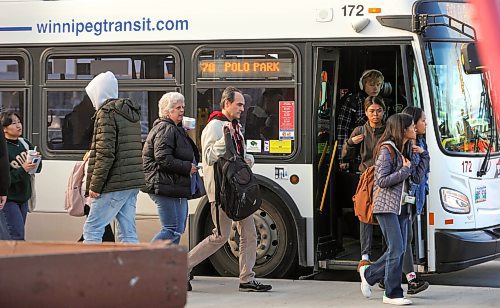 RUTH BONNEVILLE / WINNIPEG FREE PRESS

LOCAL - transit demand

Photo of people getting on and off the bus on Portage Ave. across from Polo Park Mall Tuesday.  

BUS DEMAND: Winnipeg Transit is facing the highest demand it&#x573; seen in years, amid a driver shortage that&#x573; forcing it to operate at five per cent below normal service levels. 

Story by JOYANNE 

October 24th, 2023