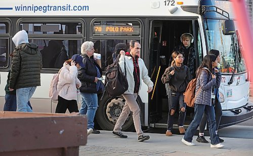 RUTH BONNEVILLE / WINNIPEG FREE PRESS

LOCAL - transit demand

Photo of people getting on and off the bus on Portage Ave. across from Polo Park Mall Tuesday.  

BUS DEMAND: Winnipeg Transit is facing the highest demand it&#x2019;s seen in years, amid a driver shortage that&#x2019;s forcing it to operate at five per cent below normal service levels. 

Story by JOYANNE 

October 24th, 2023