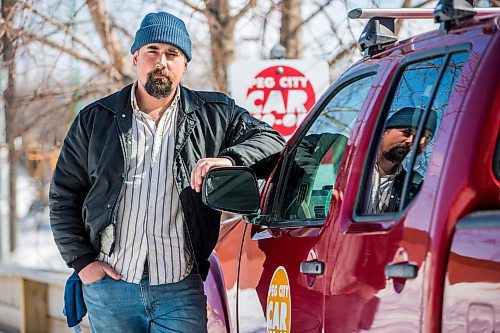 MIKAELA MACKENZIE / WINNIPEG FREE PRESS

William Belford, fleet manager for Peg City Car Co-op, poses for a portrait with the truck that had gas siphoned out of the tank in Winnipeg on Wednesday, March 16, 2022. For Erik story.
Winnipeg Free Press 2022.