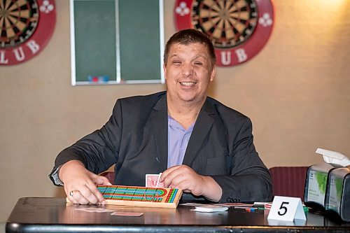 BROOK JONES / WINNIPEG FREE PRESS
Thirty-five-year-old Lyndon Demers, who is passionate about cribbage, hosts Lyndon's Cribbage Nights every second Wednesday from 6:30 to 9 p.m. on the second floor of Heather Curling Club at 120 Youville Street. As many as 20 enthusiatic cribbage players gather for the cribbage nights, rotating opponents as the evening goes along. Demers was pictured at the Heather Curling Club in Winnipeg, Man., Wednesday, Oct. 25, 2023.