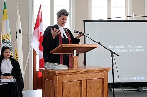 Citizenship Judge Suzanne Carriere presides over Thursday's ceremony at the Dome Building. (Abiola Odutola/The Brandon Sun)