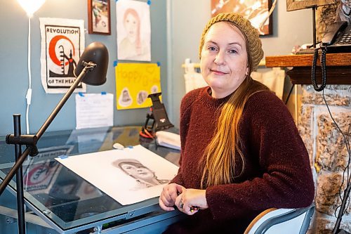 MIKAELA MACKENZIE / WINNIPEG FREE PRESS

Zastre, a self-taught artist who specializes in graphite and ink portraits, in her home studio on Wednesday, Oct. 25, 2023. Her new show &#x482;e a Better Settler&#x4e0;launches next week and features 16 portraits and essays created following interviews with Indigenous Winnipeggers about their thoughts on allyship and what it means to be a better settler. For Eva story.
Winnipeg Free Press 2023.