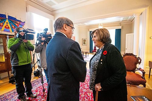 MIKAELA MACKENZIE / WINNIPEG FREE PRESS

Lieutenant Governor Anita R. Neville is presented with the first poppy of this year&#x2019;s annual Royal Canadian Legion fundraiser by Comrade Ernie Tester, president of the Royal Canadian Legion Provincial Command, at Government House on Thursday, Oct. 26, 2023. The legion&#x2019;s poppy campaign always begins on the last Friday of October, and the poppy blossoms on the lapels and collars of more than 19 million Canadians.
Winnipeg Free Press 2023.