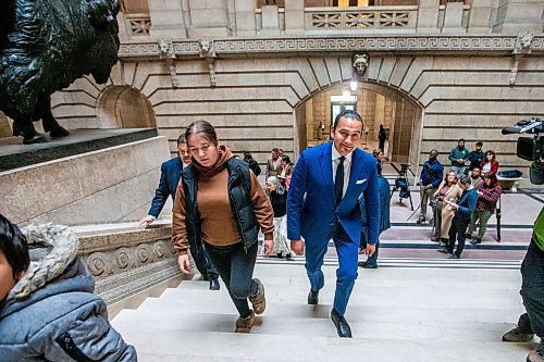 MIKAELA MACKENZIE / WINNIPEG FREE PRESS

Premier Wab Kinew walks up the stairs with Jordan Myran (sister of Marcedes Myran) before meeting with families of Morgan Harris and Marcedes Myran and Indigenous leadership at the Manitoba Legislative Building on Thursday, Oct. 26, 2023. For Chris story.
Winnipeg Free Press 2023.