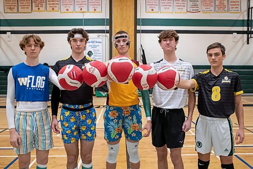 BROOK JONES / WINNIPEG FREE PRESS
The Institut Coll&#xe9;gial Vincent Massey Collegaite Trojans varsity boys volleyball team is undefeated as of Oct. 26. Pictured left to right: Grade 12 players Morgan Eby, Keon Torz, Everett Smith, Mitchell Strilchuk and Shay McKim holding volleyballs during a team practice at the school's gym in Winnipeg, Man., Thursday, Oct. 26. 2023. Missing: Grade 12 player Owen Weekes.