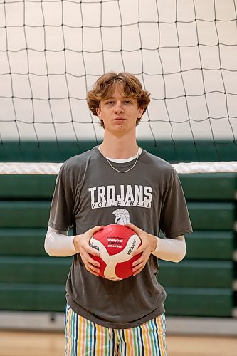 BROOK JONES / WINNIPEG FREE PRESS
The Institut Coll&#xe9;gial Vincent Massey Collegaite Trojans varsity boys volleyball team is undefeated as of Oct. 26. Pictured: Grade 12 player Keon Torz holding a volleyball during a team practice at the school's gym in Winnipeg, Man., Thursday, Oct. 26. 2023.