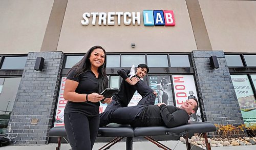 RUTH BONNEVILLE / WINNIPEG FREE PRESS

BIZ - StretchLab

Fun photo of Shelly Rabang, general manager with  StretchLab's owner, Josh Odwak, getting a stretch by Lead Flexologist: Joseph Yumang, in front of StretchLab&#x2019;s Winnipeg location on Sterling Lyon Parkway.  The actual StretchLAB,  located behind them, is still under renovations but will be open in November. 

StretchLab is focused on one-on-one assisted stretching, along with group stretch sessions. It&#x2019;s opening its first Winnipeg location next month.

See Gabby's story. 

October 25th, 2023