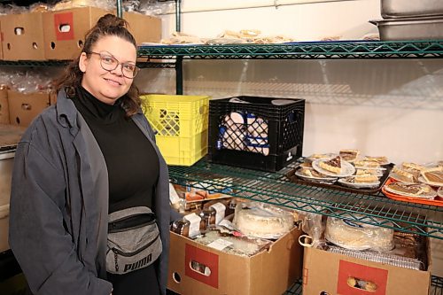 Helping Hands Centre of Brandon executive director Amanda Bray with some meals in her cooler to be served on Monday. (Abiola Odutola/The Brandon Sun)