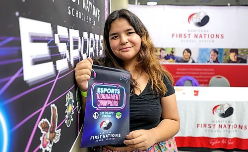 RUTH BONNEVILLE / WINNIPEG FREE PRESS

Local - FIRST NATION ESPORTS

Photo of first place winner, grade 9 student, Naeyli Desjarlais, from Brokenhead First Nation, at event with her award.  

FIRST NATION ESPORTS: The Manitoba First Nations School System is putting on an Indigenous design challenge with Minecraft Ed in Manitoba's  first fully Indigenous esports tournament at the Convention Centre Friday.  Esports clubs have been surging in popularity owing to a number of passionate teachers across the province. 

See Maggie's story. 

October 27th. 2023

October 27th, 2023