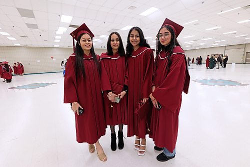 Assiniboine Community College students Gilmore Kaur, Amandeep Kaur, Navneet Kaur and Mehakdeep Kaur pose for a photo shortly before their graduation ceremony at the Keystone Centre's Manitoba Room on Friday afternoon. All four students graduated from ACC's Health Care Aide program. (Matt Goerzen/The Brandon Sun)