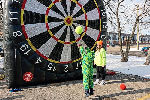 Frasier McArthur goes for the bullseye at Calvary Temple's Halloween Parking Lot Party on Sunday afternoon. Dressed in Halloween costumes, kids gathered to play games, get treats, collect donations for Samaritan House Ministries and have fun. (Colin Slark/The Brandon Sun)