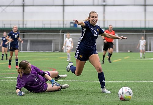 Bobcats midfielder Kenadie Janzen, right, scored twice in a 5-1 win over the CMU Blazeers in their MCAC women's soccer semifinal at WSF Soccer South on Monday. (Thomas Friesen/The Brandon Sun)